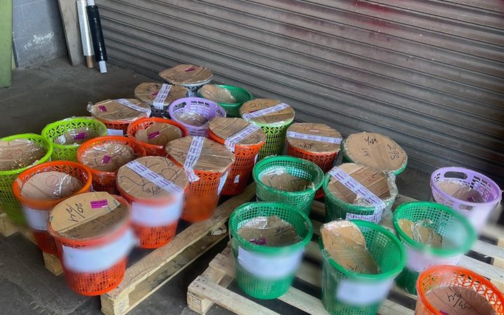 Cargo baskets packed and labelled for shipping from Nigeria to the UK