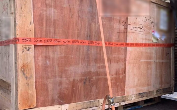 Large timber shipping crate strapped and ready for sea freight