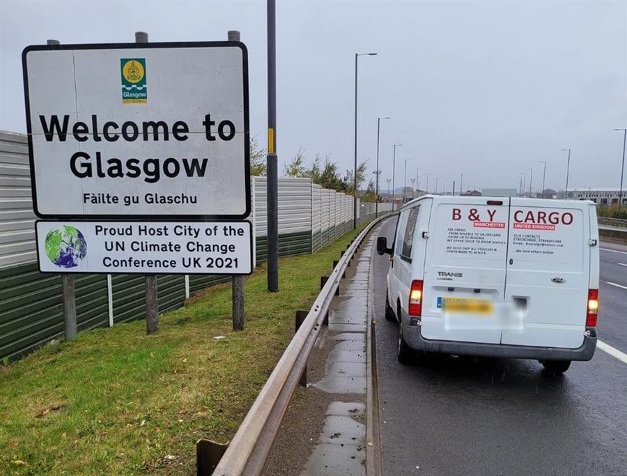 B&Y Cargo delivery van on the road in Glasgow